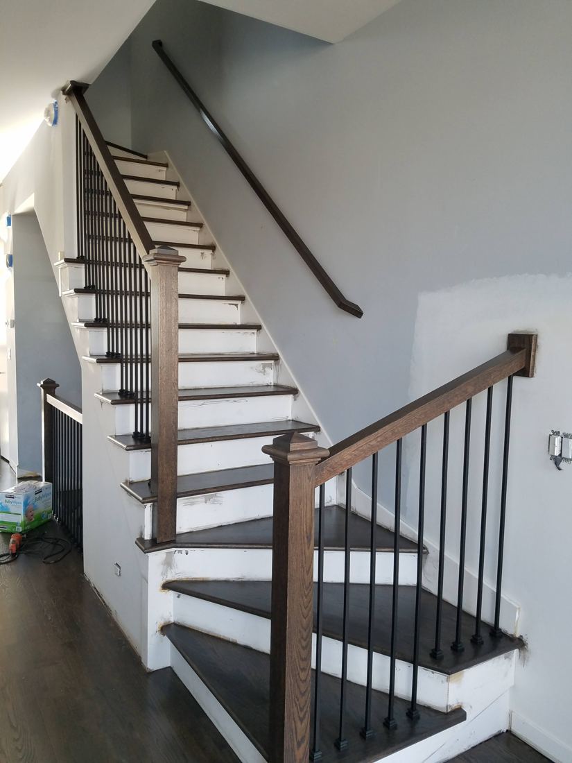 After: Carpeted stairs to stained hardwood