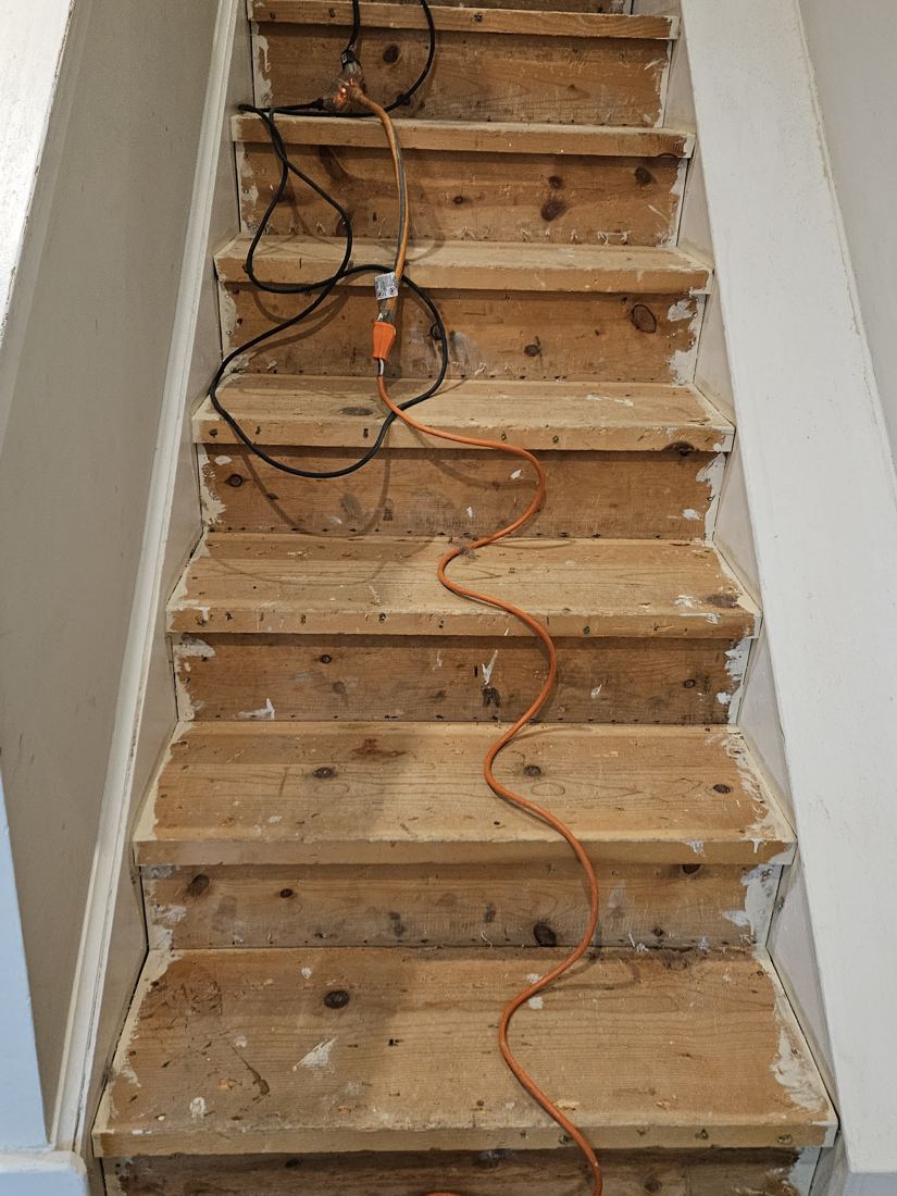 Before: Stripped stairs to new treads and risers