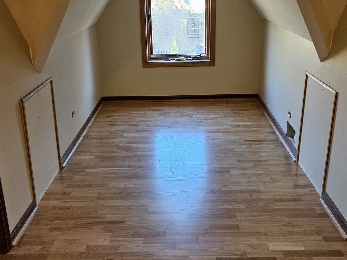 After: Attic room, bare plywood to hardwood