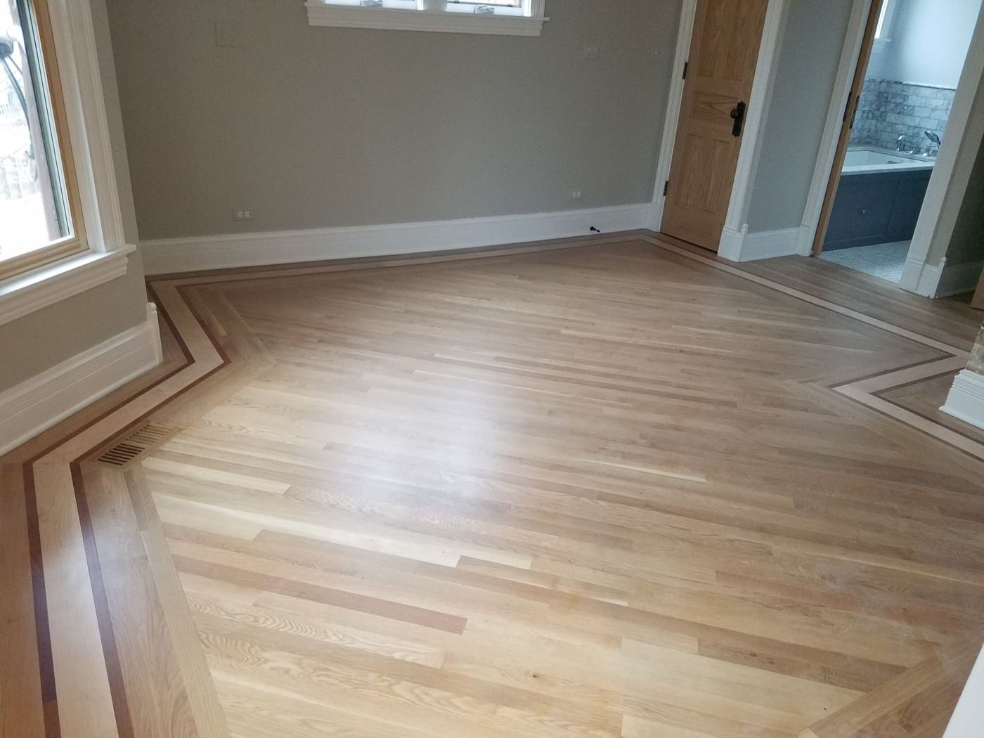 Hardwood floor completed by Artelier Floors
