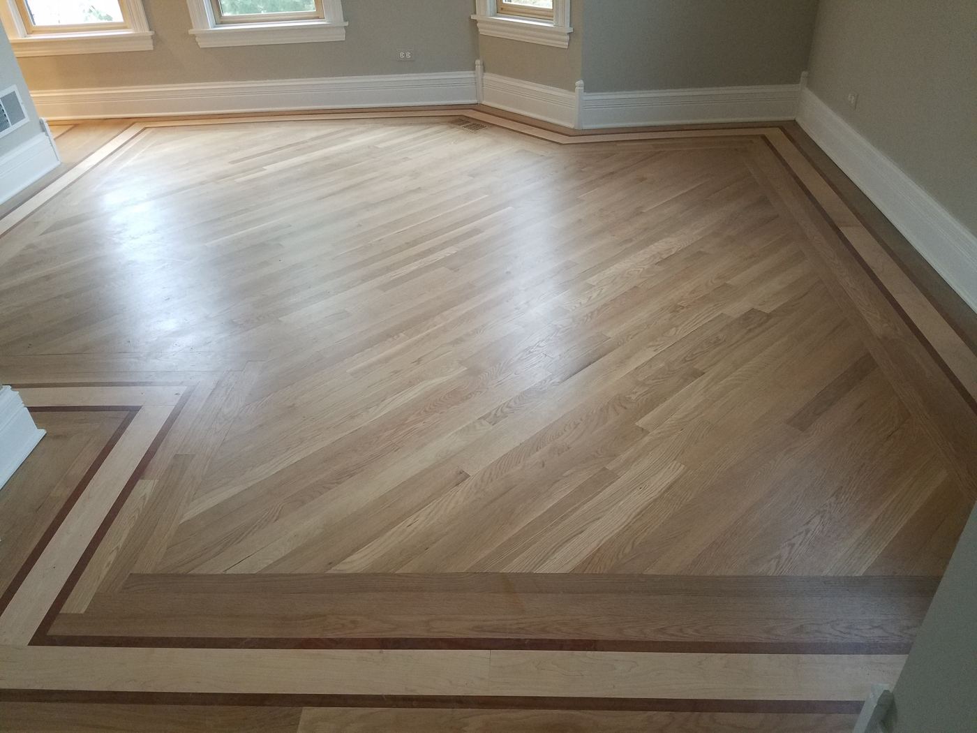 Hardwood floor completed by Artelier Floors